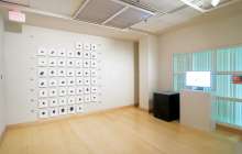 Installation view of prints of wind drawings generated with Process.2010.01 at GreenHill