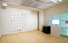 Installation view of prints of wind drawings generated with Process.2010.01 at GreenHill