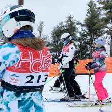 Racers with High Country Junior Race Series bib